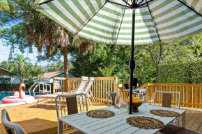 Urban Flamingo Retreat Modern Meets Tropical in this Beautiful, Updated Pet Friendly 3BD Pool Home with Outdoor Living Space